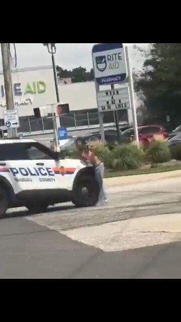 Police run over woman waving gun around in public, lives saved