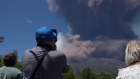Smoke rising from Italy's Etna volcano as it erupts