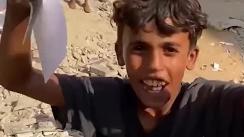 Children in Gaza City are tearing up Israeli evacuation flyers