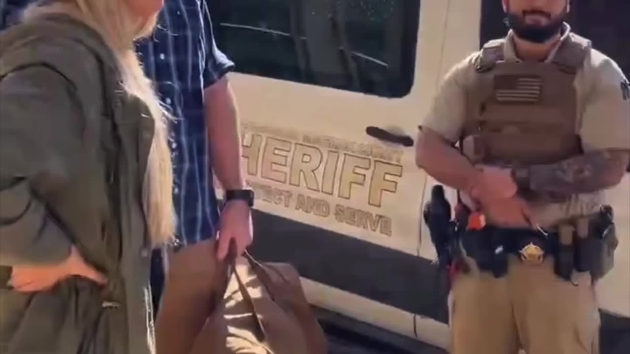 Maverick County Sheriff pulls up to the SA airport Departures Terminal with a female prisoner