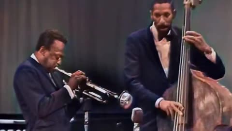 Miles Davis trumpet floats, Ron Carter’s bass grounds it—‘Autumn Leaves’ never sounded so rich