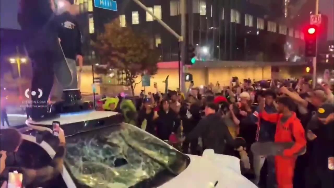 LAPD stand around as hundreds of skateboarders destroy downtown Los Angeles