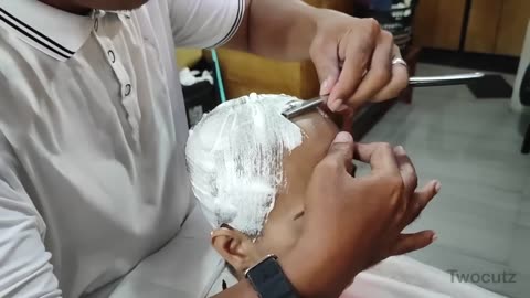 Women gets headshave at barbershop