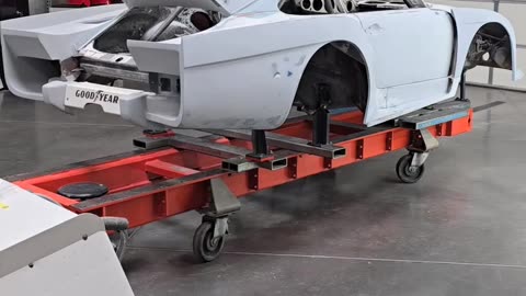 Porsche 935 Big Body Tribute On a Celette frame machine getting some TLC.