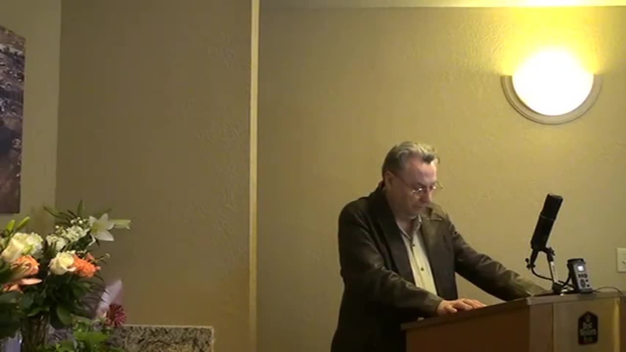 Clive Doyle reading the names of the fallen