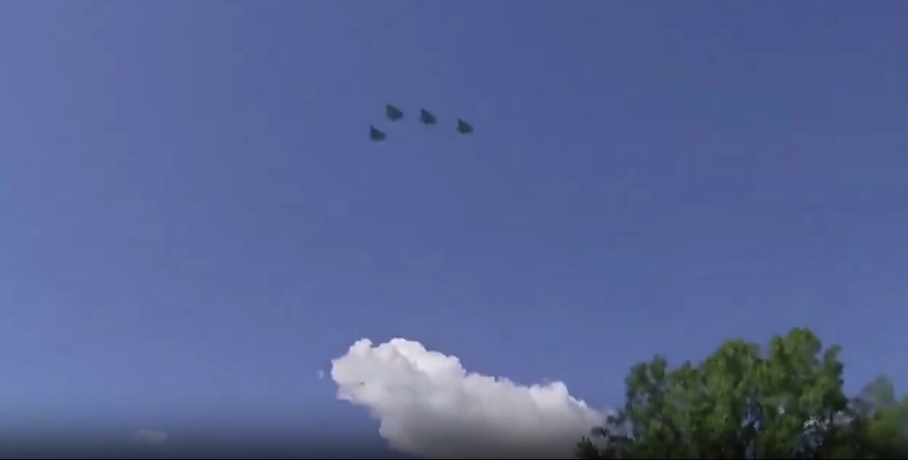 A flyover honors a fallen Polish army F-16 pilot as Polish President Karol Nawrocki