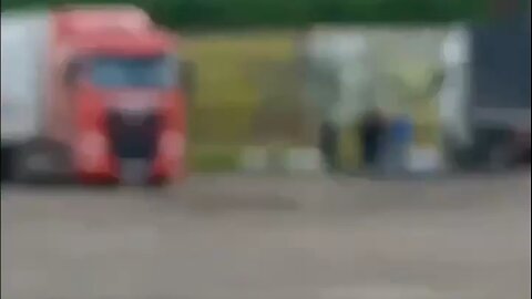 Video shows Russian men climbing onto a truck launching Ukrainian drones in an attempt to stop them