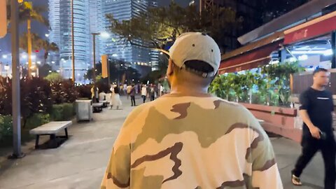Malaysia's 'selfie men' hustle at twin towers