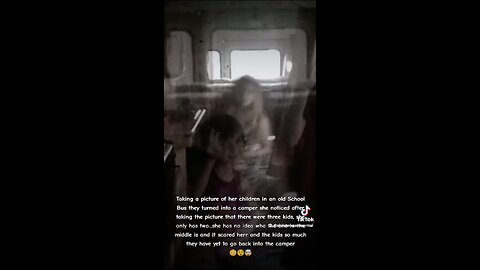 Ghost of a girl is captured between brother and sister