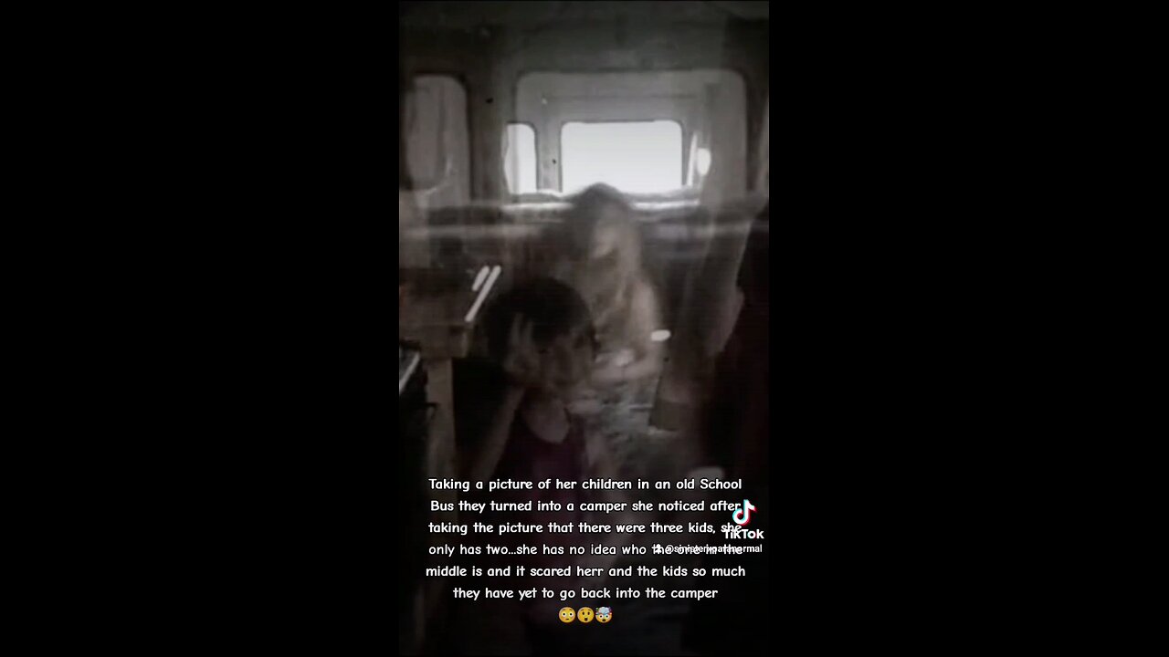 Ghost of a girl is captured between brother and sister