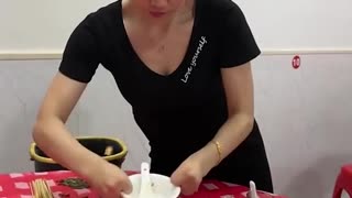 Woman with amputated hands cleaning up!.hd