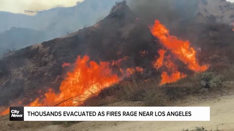 Thousands evacuated as fires rage near Los Angeles