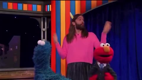 Johnathan Van Ness who offered to show Elmo and Cookie Monster his ‘monster piece.