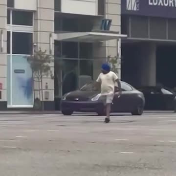 Crazed Driver Learns the Hard Way That It’s a Bad Idea to Take a Machete to a Gunfight