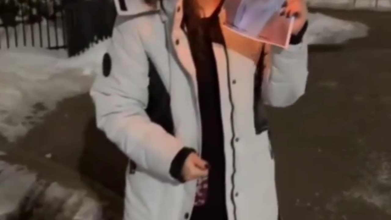 Persian Lady lightning up a cigarette - Iran Protest