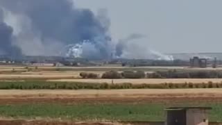 Syrian media reports explosions at a munitions depot at an air defense base near Hama