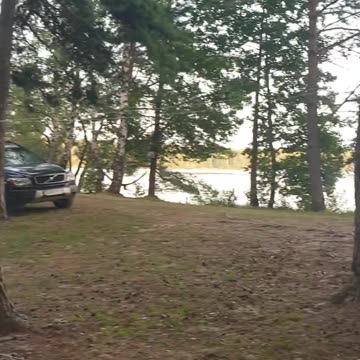 Camping with a campfire and a tent