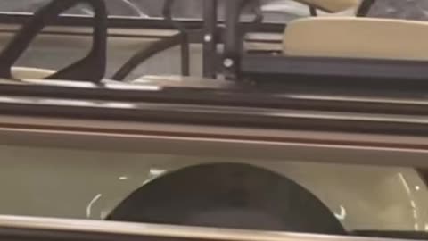 Drunk Wyoming man steals an airport golf cart then rides it down a moving walkway.