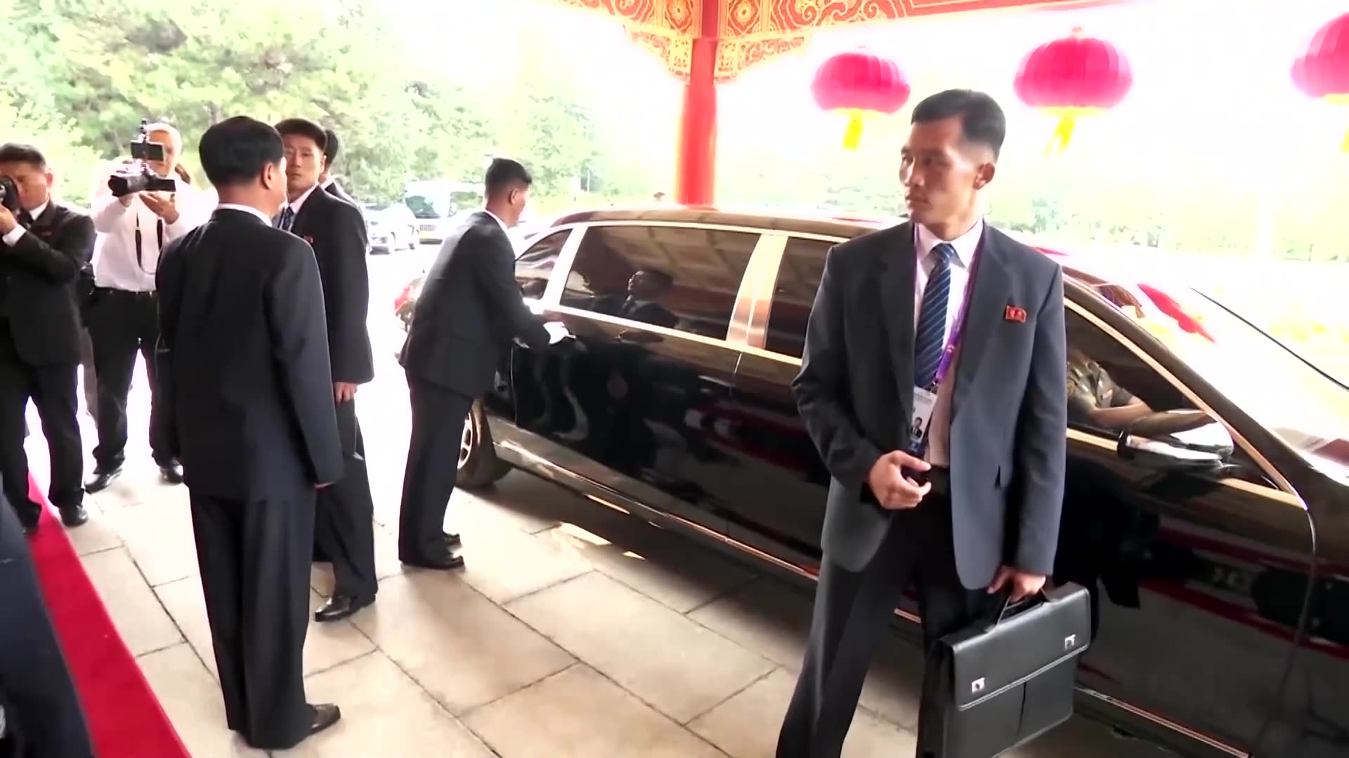 Putin and Kim hug as they bid farewell after Beijing meeting