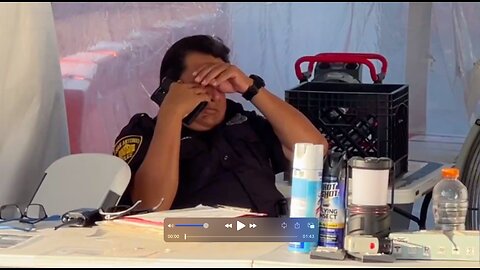 I record two SA Police officers at the gate of the ARC talking to their sidekick