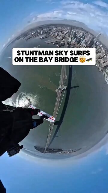 STUNTMAN SKY SURFS ON THE BAY BRIDGE
