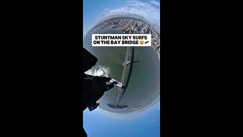 STUNTMAN SKY SURFS ON THE BAY BRIDGE