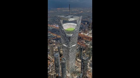 An aerial flyby of a skyscraper stadium design 😲