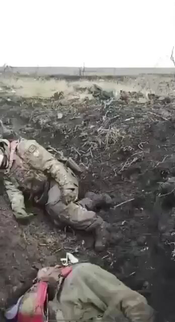 Fallen Russian soldiers, including one female soldier