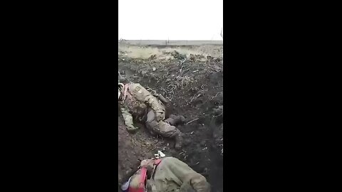 Fallen Russian soldiers, including one female soldier