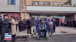 NYPD officers honor Officer Sharjeel Waris as he’s discharged from the hospital after surviving