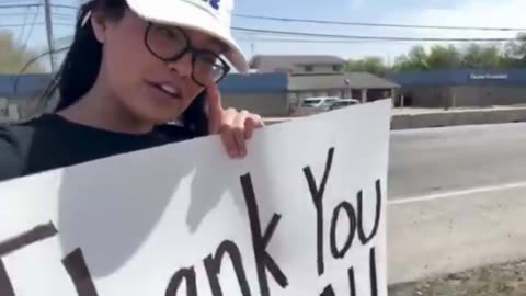 Savannah Hernandez Answers Protesters With Counter-message : "BUY TESLA"