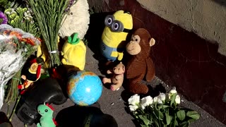 Ukrainians mourn victims of Russian strike on Kyiv
