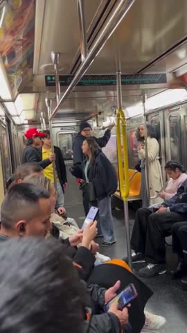 HAT TRIP: ICYMI, Straphanger Tries to Steal Man's MAGA Hat, Falls Flat on Her Face [WATCH]