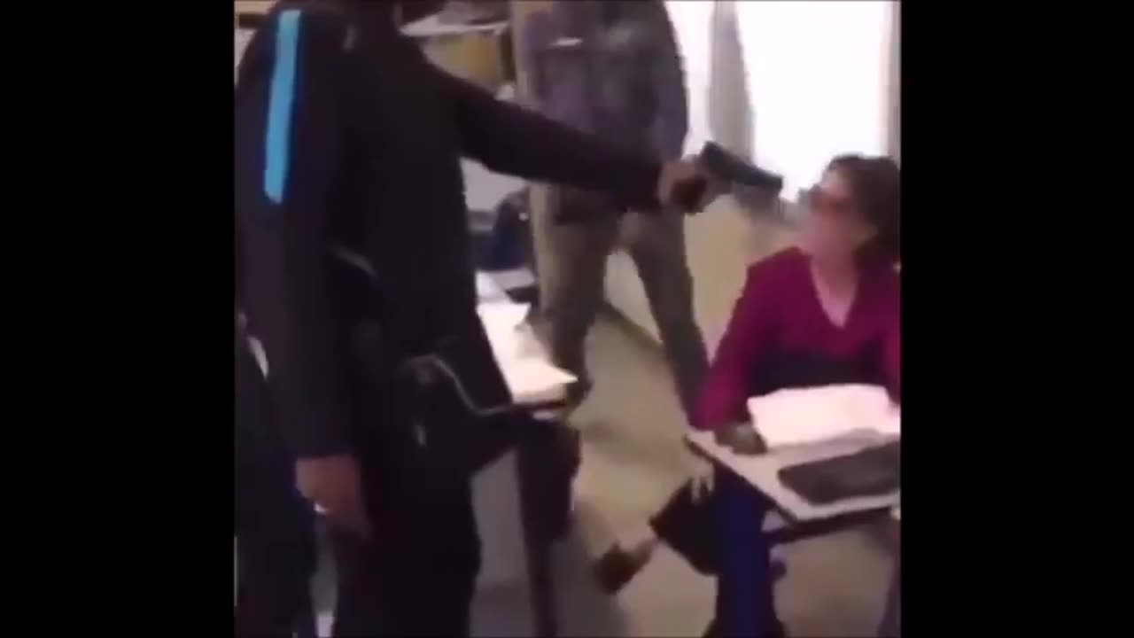African Students in French School Hold Gun to Teachers Head and Laugh