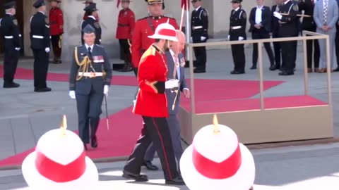 King Charles arrives to open a new session of Canada's parliament