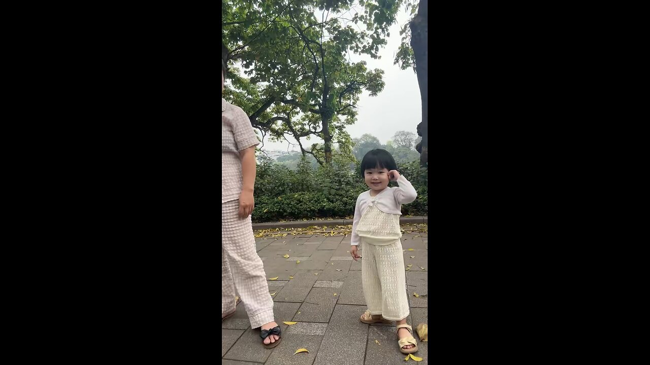 Beautiful Little Girl Runs Joyously By The Lake !