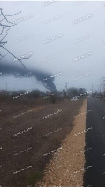 Port of Taman, one of the damaged vessels is on fire.