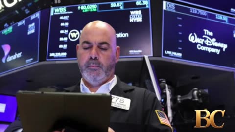 Wall Street edges higher on Friday, pushing S&P 500 close to its record high