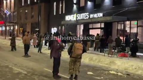 Protesters blocked off streets in Minneapolis around a hotel they think DHS agents are in.