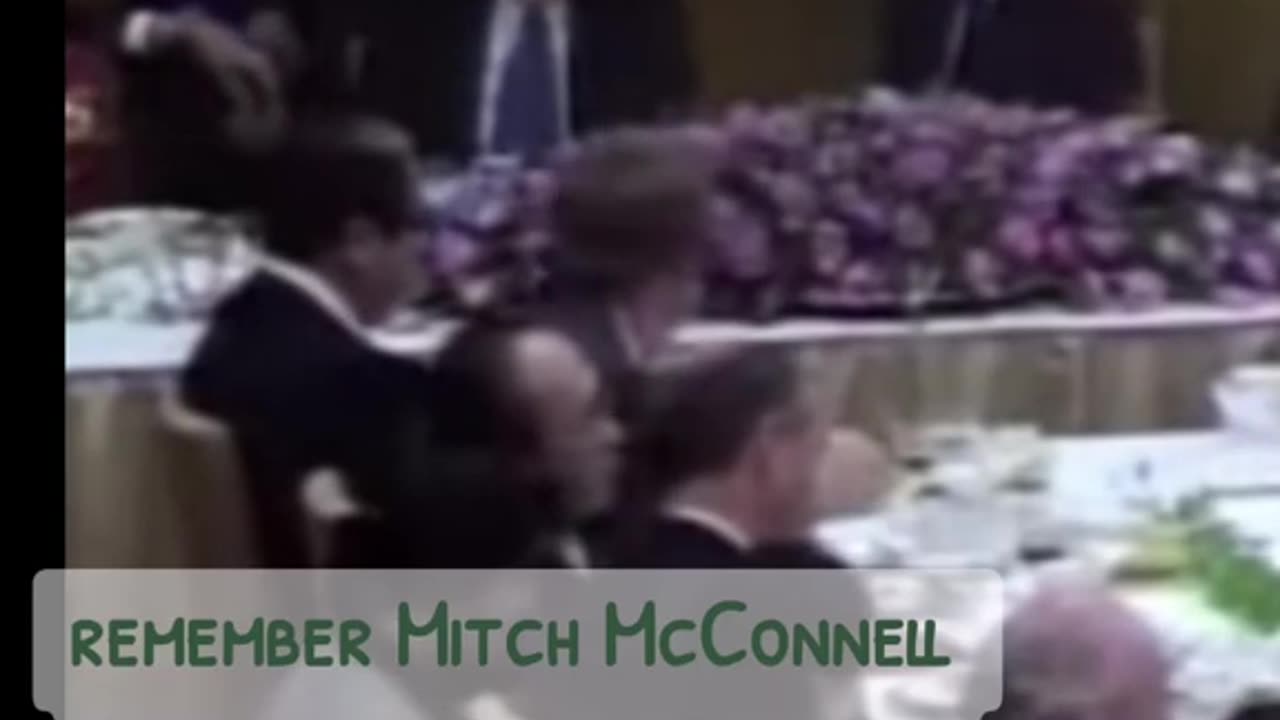 Looks like THE guy behind him STABBED H.W.BUSH with a needle maybe and Mrs Bush