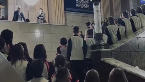 Carol of the Bells" right at Kyiv’s central railway station.