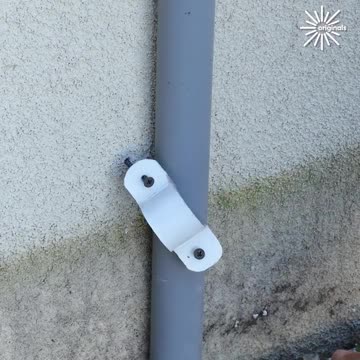 Attaching pipe clamps using power tools.hd