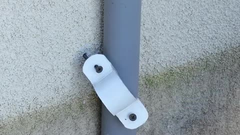 Attaching pipe clamps using power tools.hd