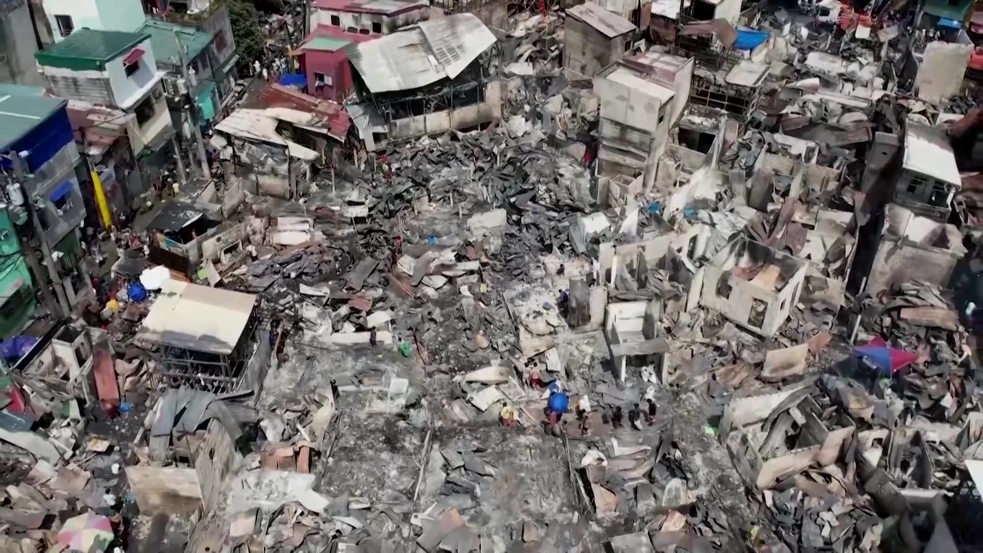 Drone footage shows residential area gutted after fire in Metro Manila