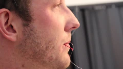 Fish hook through the cheek