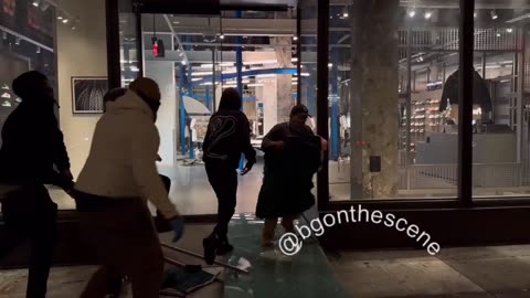 More chaos in LA –as looters flee Adidas store with armfuls of merchandise