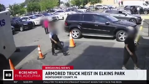 Surveillance video shows two armed men robbing a Brinks armored truck in Elkins Park, PA
