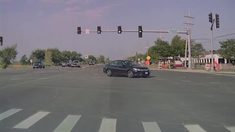 Car Runs Red Light In Front Of Unmarked Police SUV