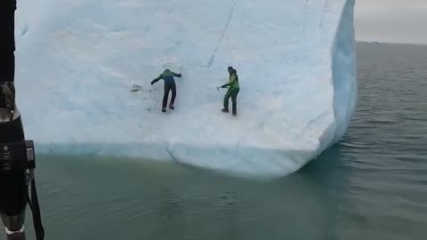 Iceberg flips on explorers..