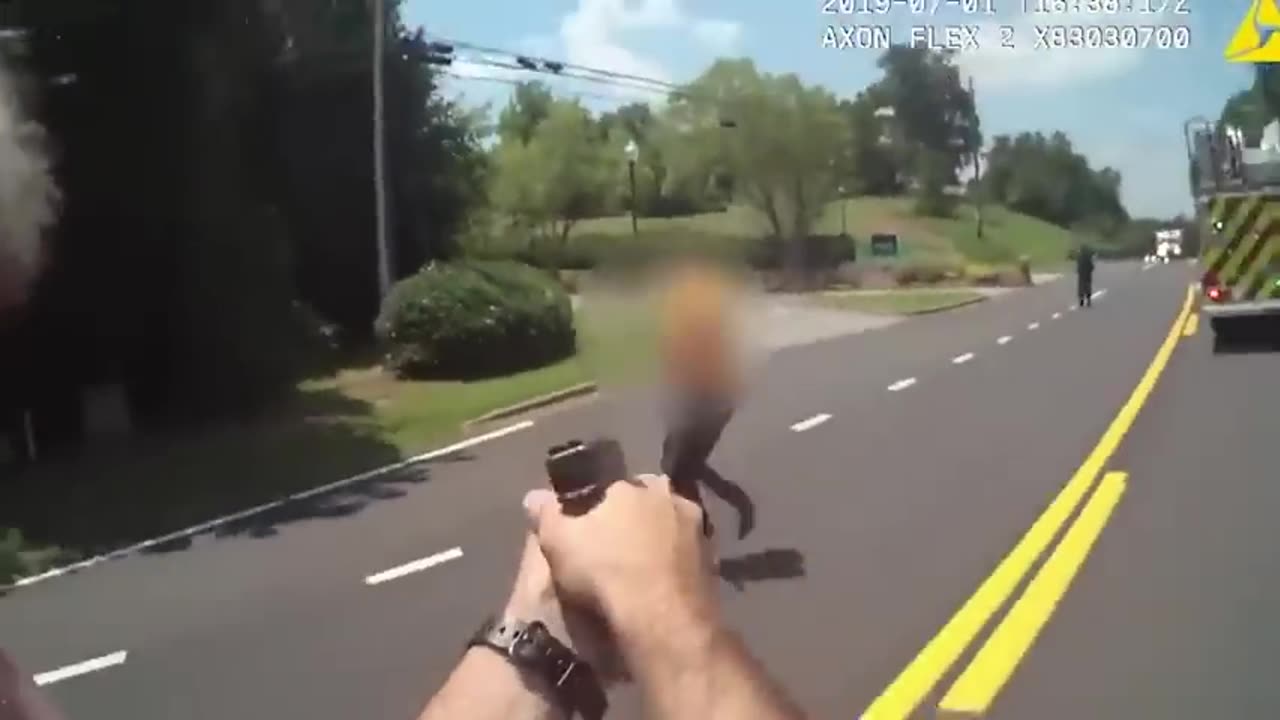 Man With a Knife charges at the Police Officer, Which Shoot him Down.